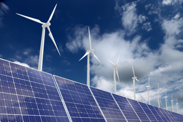 solar panels and wind turbines representing renewable energy